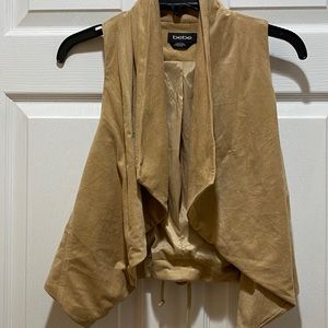 Bebe velour vest with lace up back.